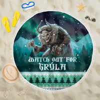 Round green beach blanket with white fringe, Gryla monster graphic