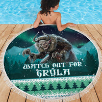 Round green beach blanket on deck, Gryla monster print with starry night