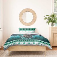 Green Christmas bedding set with mountain print and patterned pillow sham
