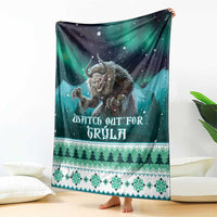 Green Christmas throw blanket with Gryla under night stars and white snowflake band