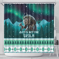 Green shower curtain with Grýla and winter landscape print, holiday text