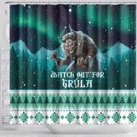 Green shower curtain with Grýla, snowy mountains, and Nordic holiday pattern
