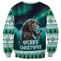 Green unisex Christmas sweatshirt with wolf-like monster face and Merry Christmas text
