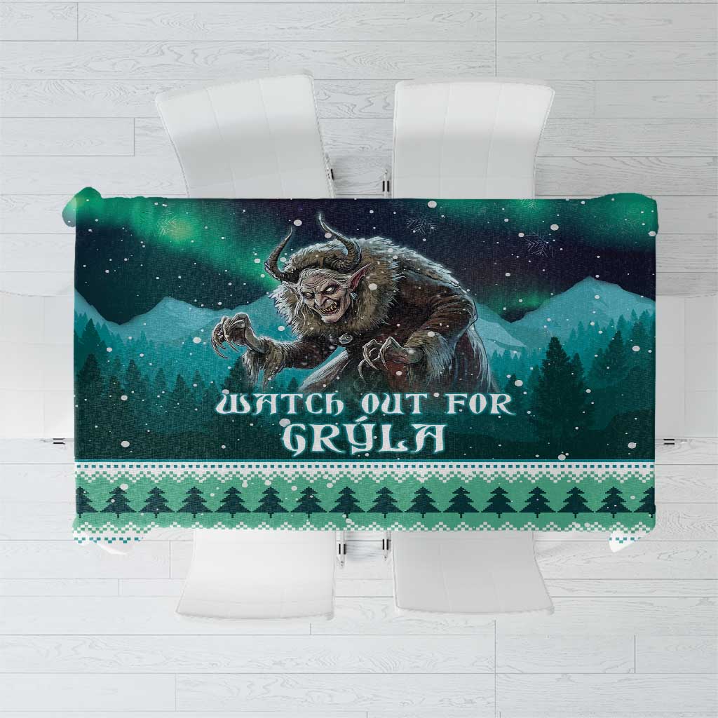 Green Christmas tablecloth with Gryla witch print, starry night, and holiday icons