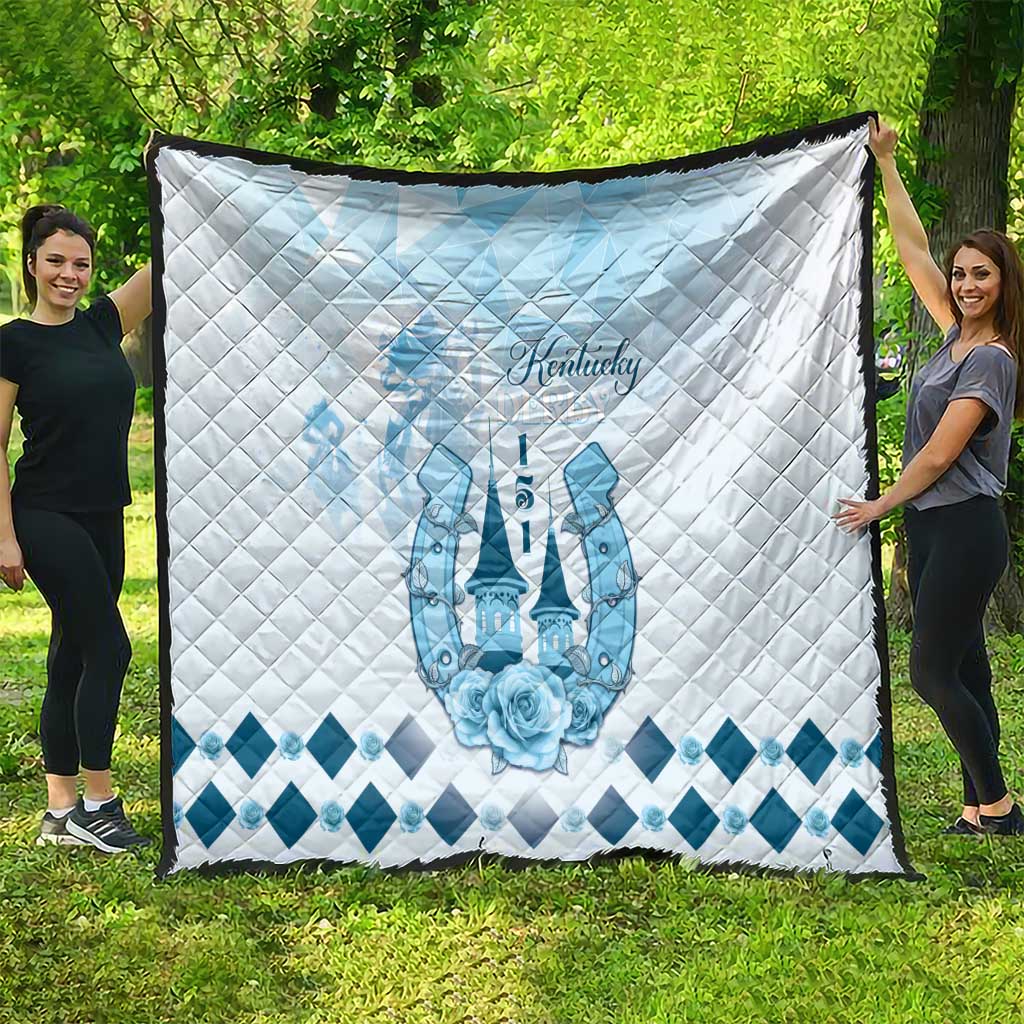 White quilt with blue Kentucky script, horse emblem and diamond border