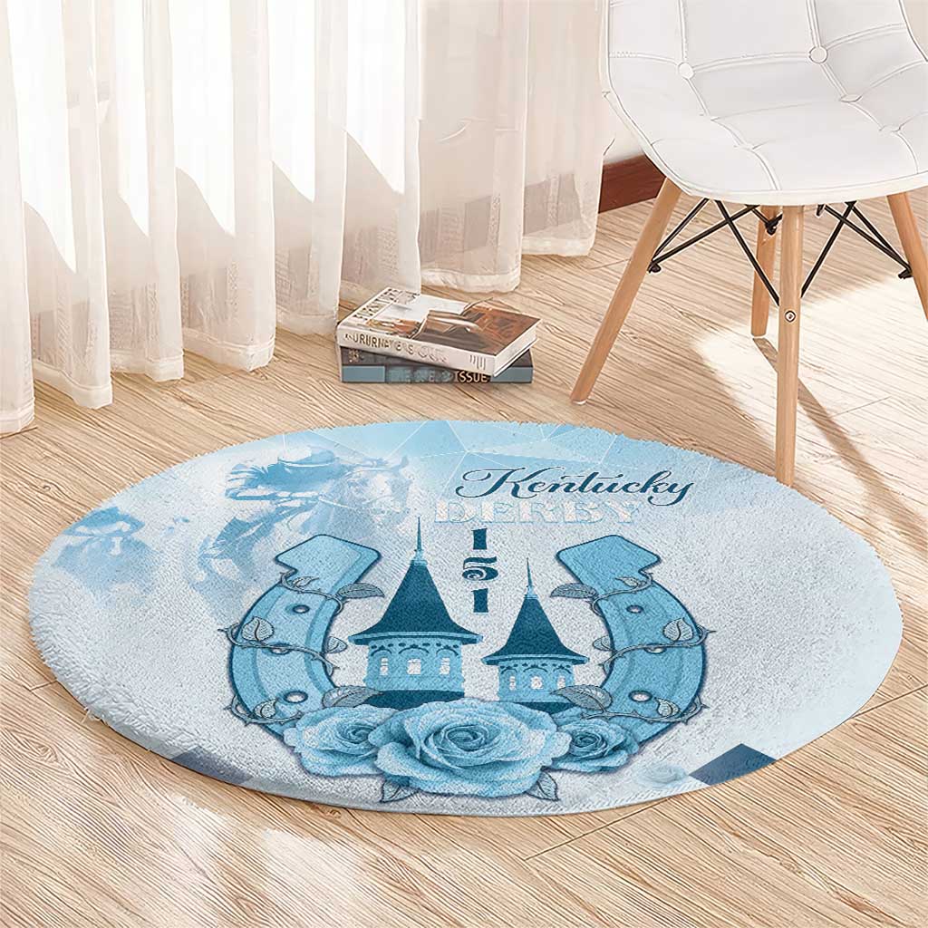 Blue round carpet with Kentucky Derby text, horses flanking a castle, and rose accents