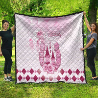 Pink and white quilt featuring Kentucky text, horse emblem, and diamond-pattern border