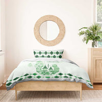 Green and white bedding set with Kentucky Derby emblem, diamond trim duvet and pillowcases
