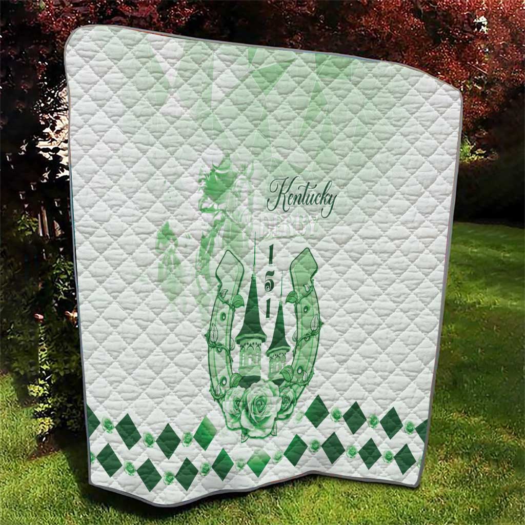 White quilt with green Kentucky horse crest, diamond quilting, and green check edge