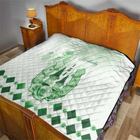 White quilt with green Kentucky horse and rose design, diamond quilting and check trim