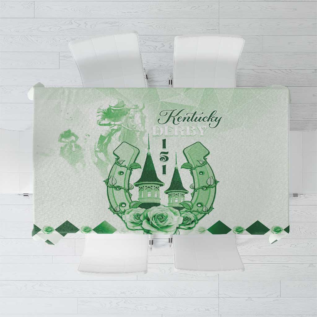 Green tablecloth with horse-themed crest and floral border design