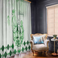 Green horse-themed window curtain with diamond hem detail, draped beside a chair.
