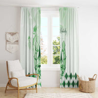 Green horse-and-diamond window curtain panels with rod-top header in a living room setting.