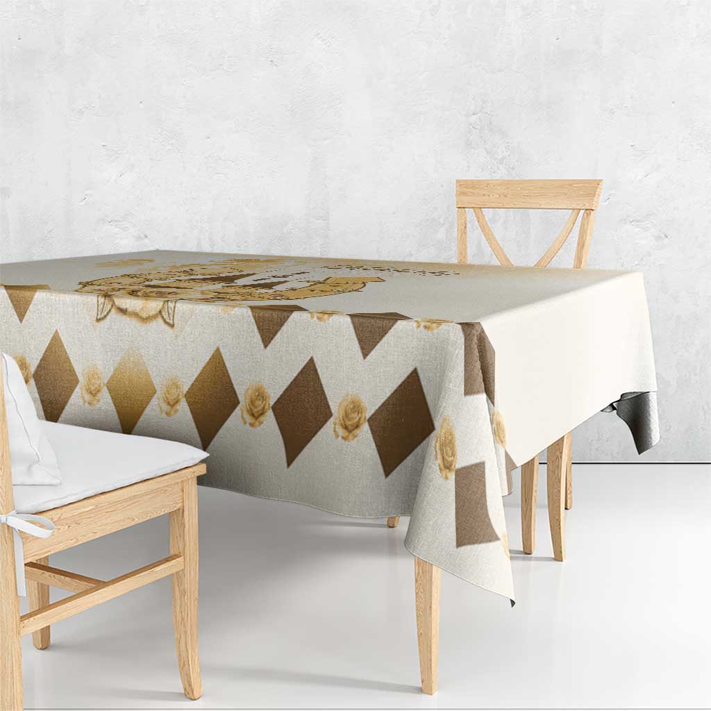 Beige tablecloth with brown diamond pattern and gold rose trim
