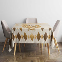 Beige tablecloth with brown diamonds and gold horse-themed emblem center