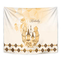Beige tapestry close-up with gold Kentucky Derby 151 emblem, roses, and diamond border.