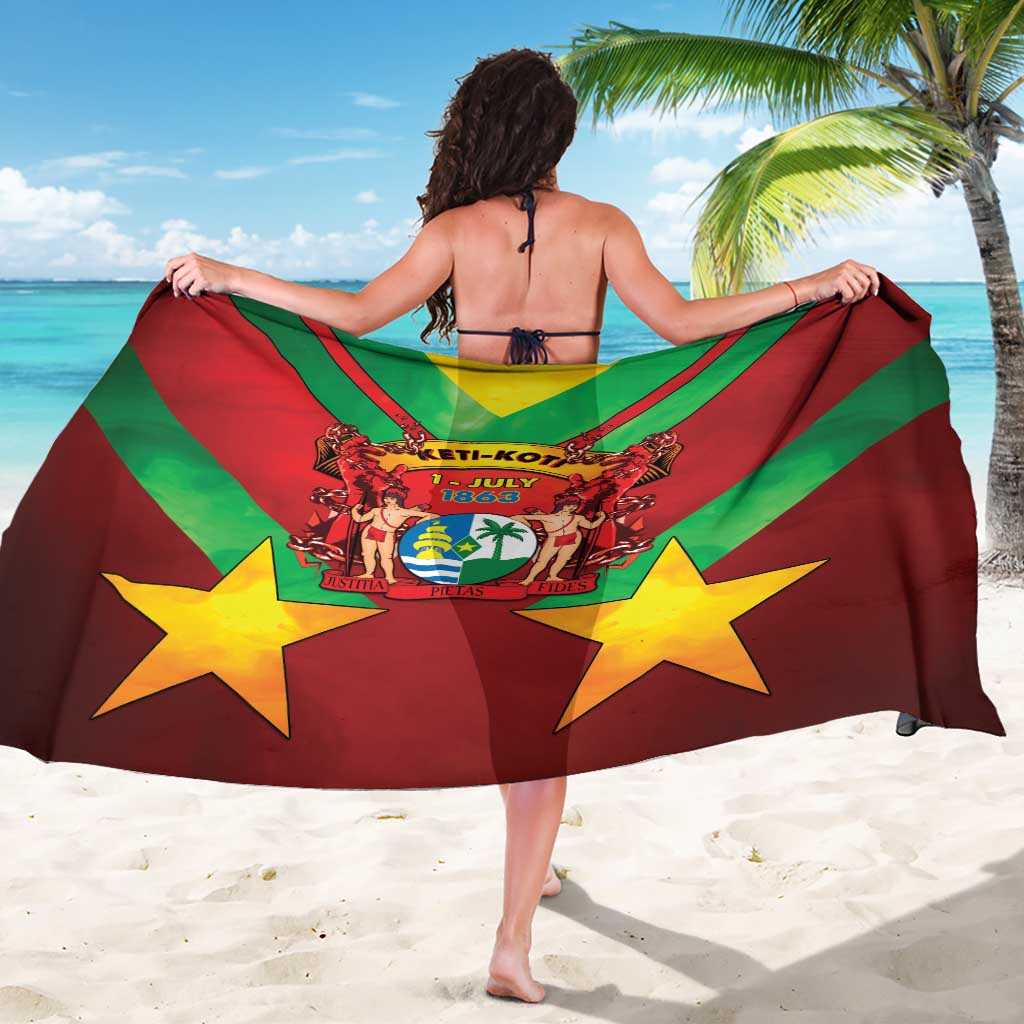 Red and green diagonal striped sarong with yellow stars and crest, draped for coverage