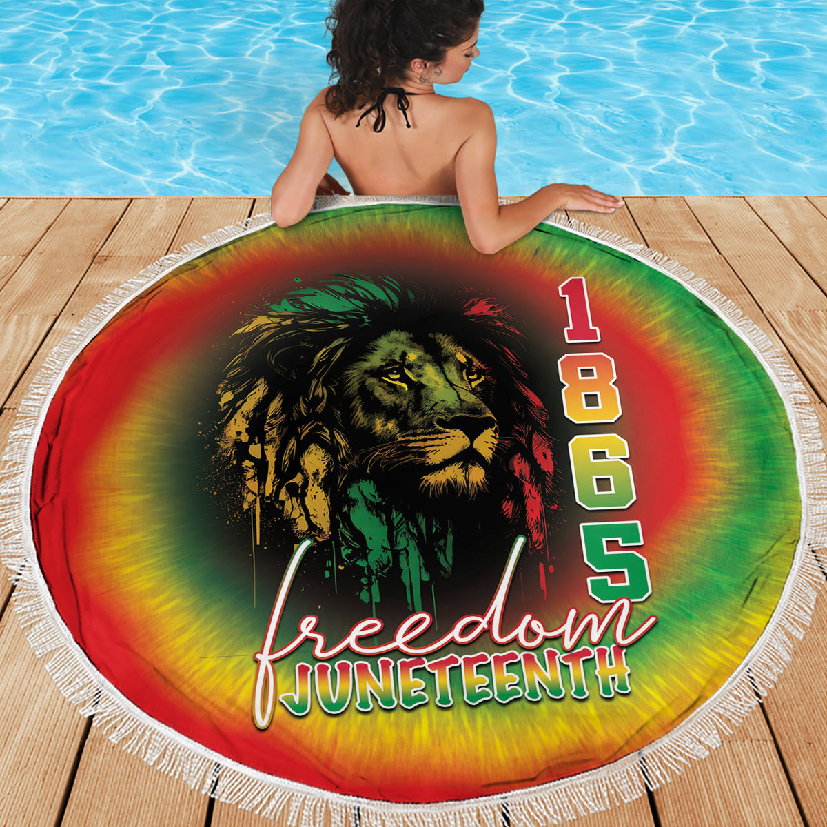 Round beach blanket featuring rainbow tie-dye lion portrait, 1865 Freedom Juneteenth text, fringe