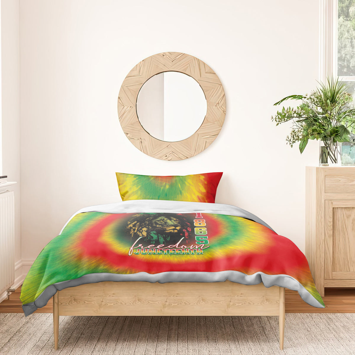 Reggae tie-dye duvet with lion graphic and 'Freedom Juneteenth' on bed