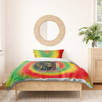 Reggae tie-dye duvet with lion graphic and 'Freedom Juneteenth' on bed