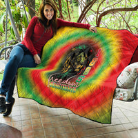 Juneteenth quilt draped outdoors in red, green, and yellow tie-dye with lion and 1865