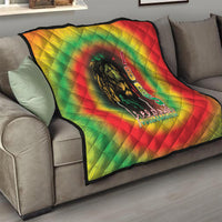 Colorful tie-dye Juneteenth freedom quilt on sofa with lion portrait and 1865 numbers