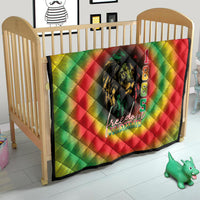 Juneteenth quilt on crib, red green yellow tie-dye lion portrait with Freedom Juneteenth text