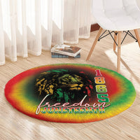 Round tie-dye Juneteenth rug with lion design and “Freedom Juneteenth” text