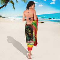 Rainbow tie-dye sarong with lion and '1865' vertical text, worn with ties.