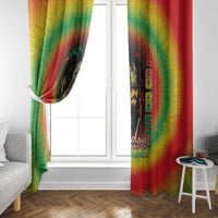 Juneteenth window curtain, rainbow tie-dye panels with 1865 vertical text by window