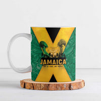 Green ceramic Jamaica-themed mug with black and gold X design and handle