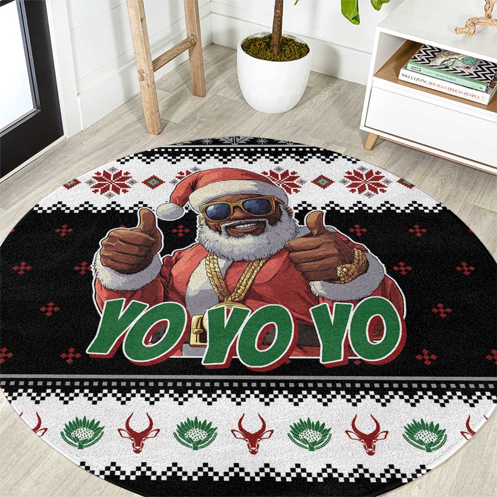 Black round Christmas rug with Santa cartoon face, yo-yo lettering, festive border pattern