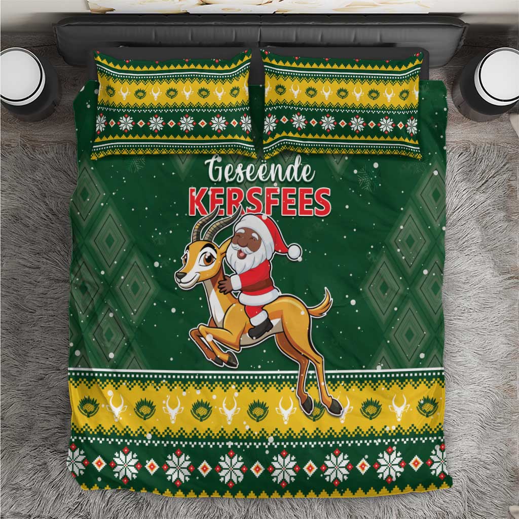 Green Christmas bedding set with Santa riding a springbok, yellow and red patterned trim