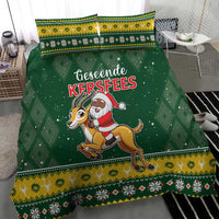 Green Christmas duvet cover set with Santa riding springbok graphic and diamond pattern border