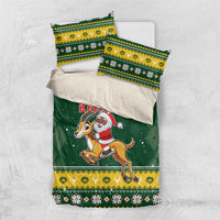 Green Christmas duvet cover set with two pillowcases, Santa riding springbok artwork