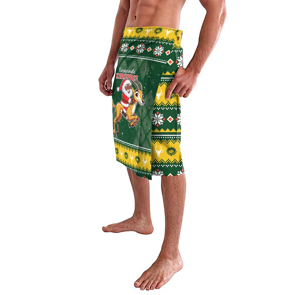 Green Christmas lavalava wrap skirt with Santa riding springbok on front panel