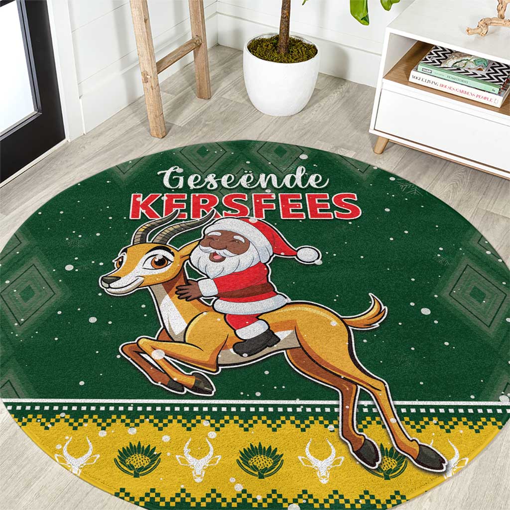 Green round rug showing Santa on springbok, festive KERSFEES lettering and stars