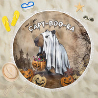 Round Halloween beach blanket with fringe edge, beige CAPY BOO-RA capybara and pumpkins graphic