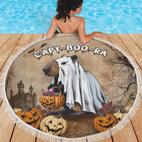 Round Halloween beach blanket with fringe edge, CAPY BOO-RA capybara in haunted scene graphic