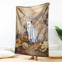 Halloween blanket with capybara ghost on beige background, draped showing pumpkin border