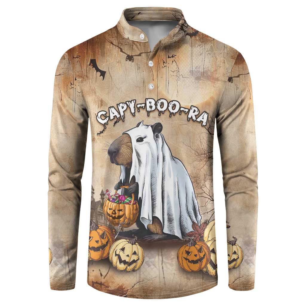 Beige long-sleeve button sweatshirt with cartoon capybara and pumpkins graphic.