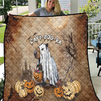 Brown beige quilt with diamond quilting and CAPY-BOO-RA cat, surrounded by Halloween pumpkins