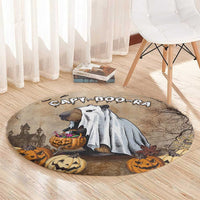 Beige round Halloween rug with capybara, pumpkins, and spooky text design