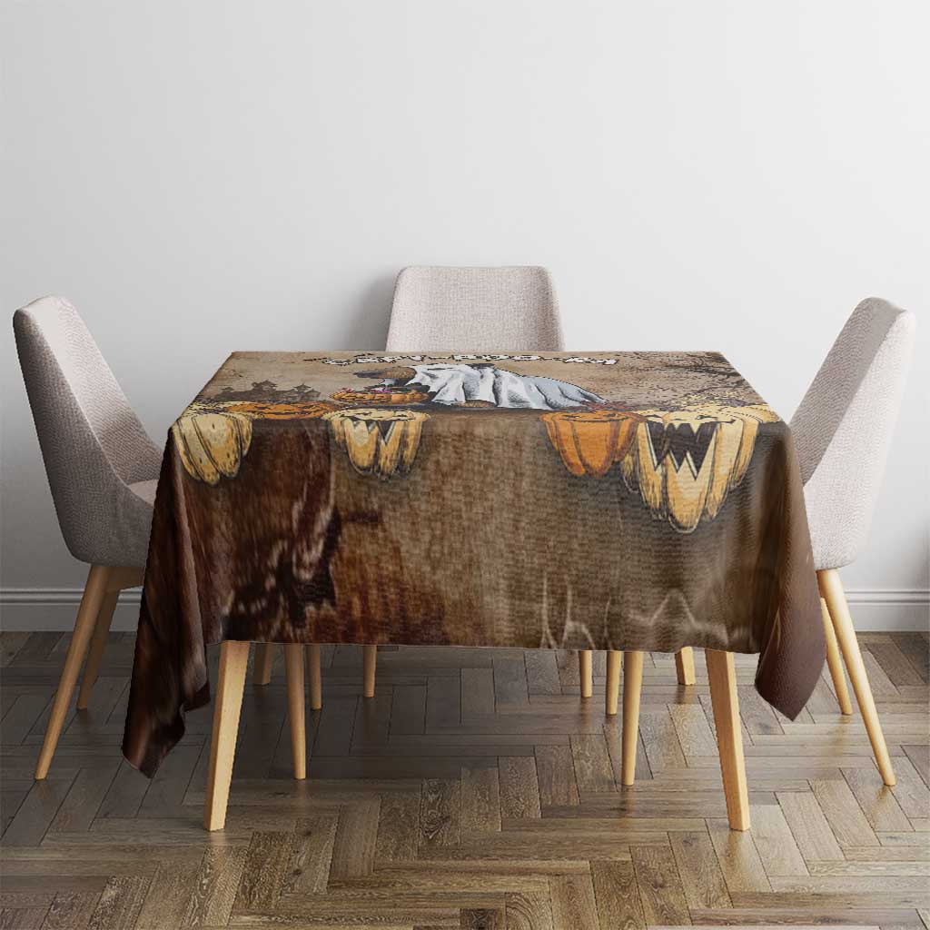 Spooky brown Halloween tablecloth with capybara scene and orange pumpkin highlights