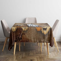 Spooky brown Halloween tablecloth with capybara scene and orange pumpkin highlights