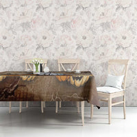 Brown Halloween tablecloth with capybara and pumpkins, framed by dark branches
