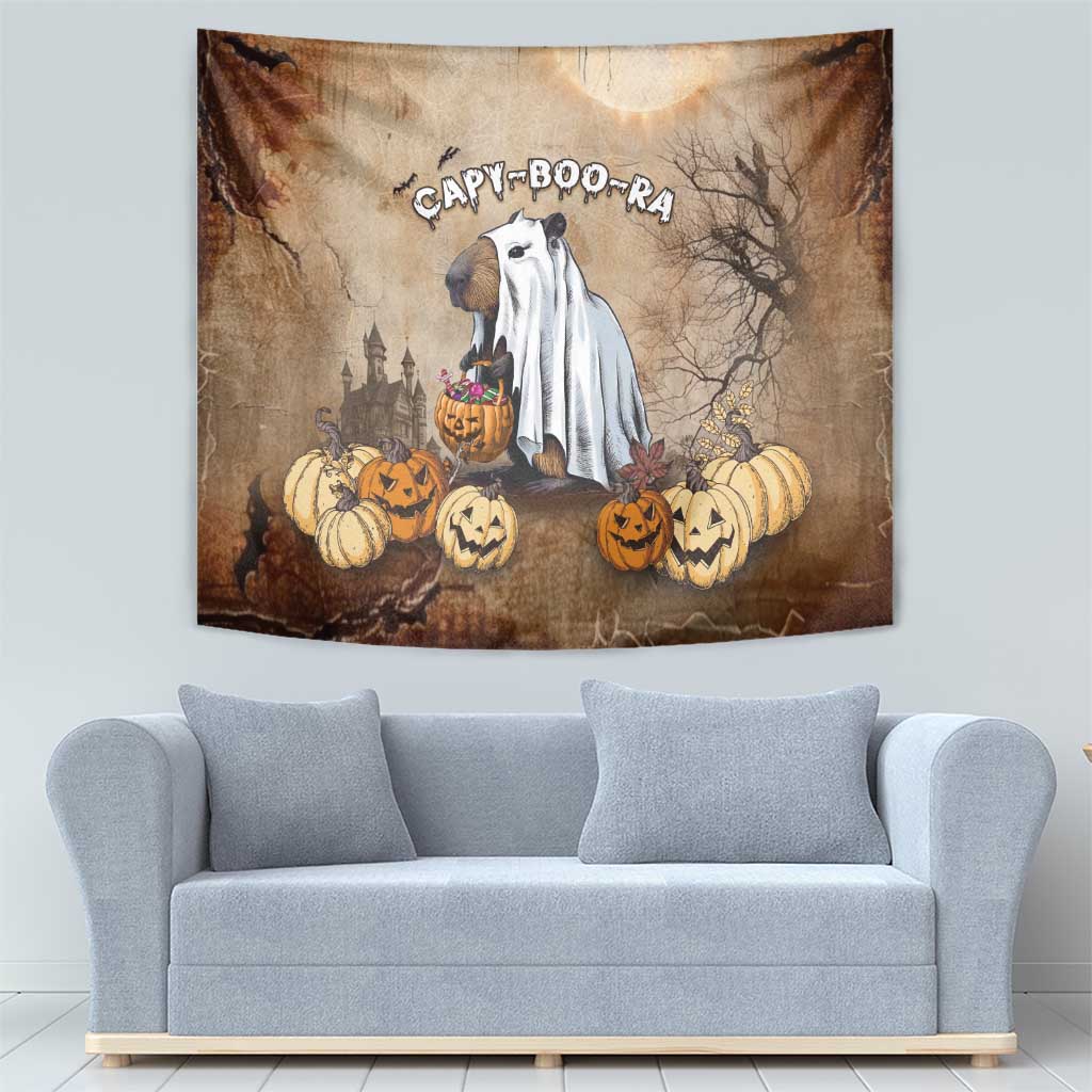 Halloween capybara tapestry on beige background with ghost cape, pumpkins, and “CAPY-BOO-RA”