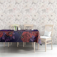 Purple rose tablecloth on bench and chairs with gothic floral pattern and spiderwebs