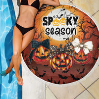 Orange round Halloween beach blanket with fringe, "Spooky season" pumpkin print