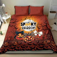 Orange Halloween duvet and two pillowcases with “Spooky season” text and jack-o’-lanterns